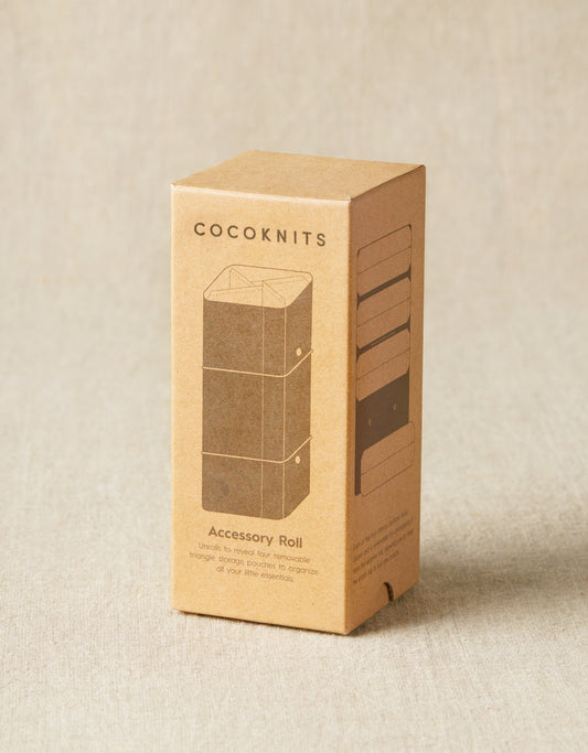 Cocoknits accessory roll packaging on a beige background