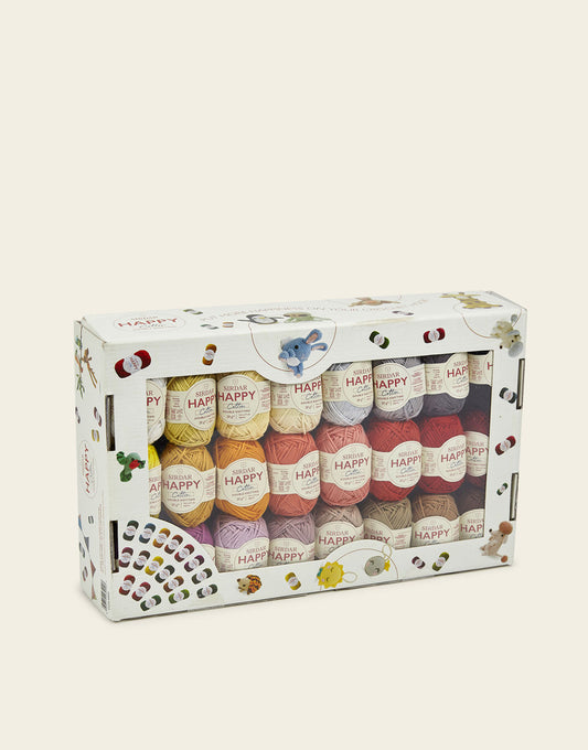 Set of yarn balls in a decorative box on a white background